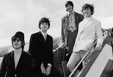 The Beatles desembarking from plane at Heathrow Airport (Getty)