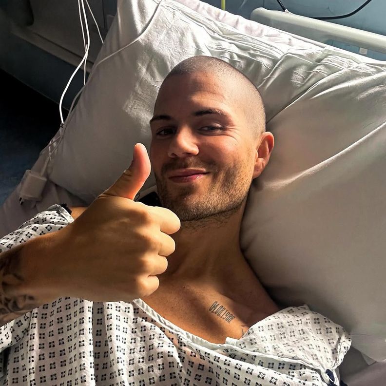 The Wanted star Max George gets a special visit in hospital from actress star girlfriend Maisie Smith as he prepares for heart surgery